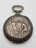Unusual oversized silver tone pocket watch with coal miner design