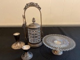 Rogers pickle castor, sterling candle holders, sterling based glass compote.