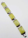 Wide faceted green stone sterling silver bracelet