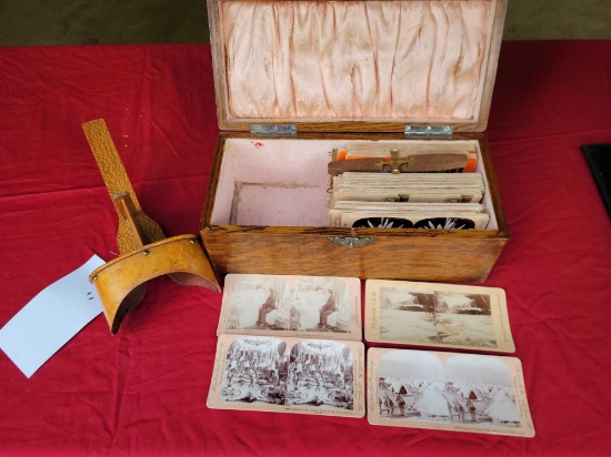 Stereopitic viewer with cards and wood case