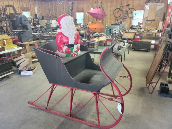 Early wood sleigh with Santa figure