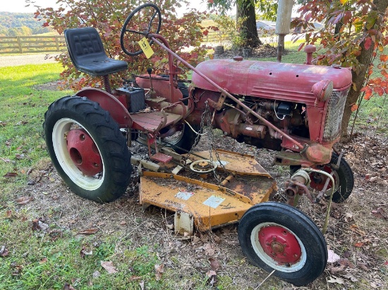 Farmall Cub tractor with Woods 42 belly mower and rear wheel weights