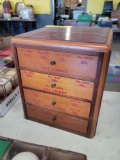 Comb cabinet with signed photo