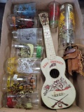 Davy crockett glasses, mini guitar, and canteen