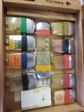 Display case with 12 collector lighters