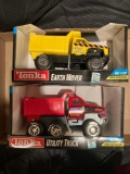 Tonka earth mover and utility truck