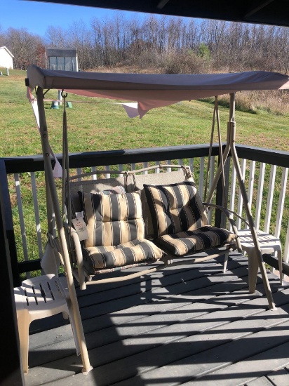 porch swing and two side tables
