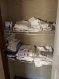 towels and iron in closet