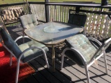 patio table and four chairs