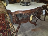 marble top carved wood victorian table with carved dog on base