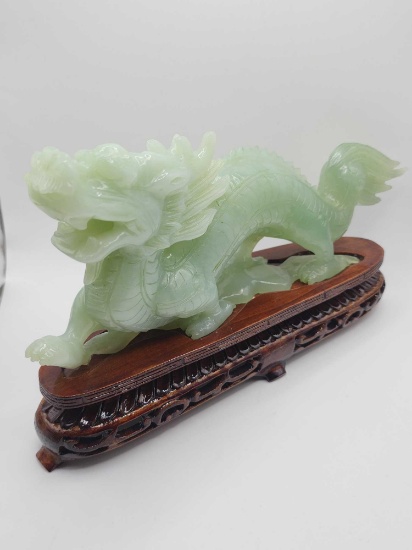 Chinese carved Jade / Jadeite dragon on wooden base