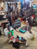 clothes rack with purses and wallets