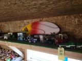 trucks, toy tractors, skim board