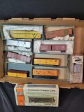 Group of HO box and freight cars, some customized