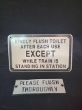 Porcelain ease flush thoroughly and metal kindly flush railroad signs