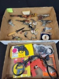 Vintage squirt and cap guns, rubber cuffs and accessories
