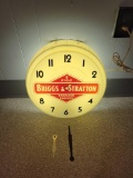 Briggs and Stratton 4 cycle plastic light up clock, cracked face and detached hands