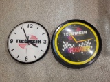 Pair of Tecumseh battery op advertising clocks