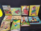 Group of vintage childs puzzles and 2 books