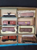 Group of HO box and tank cars, some customized