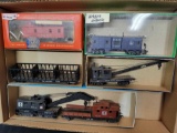 Group of HO cars, cranes, cabooses, freight car