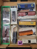 Group of HO cars, caboose, model kits and lionel milk car