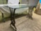 Early Iron base glass top table