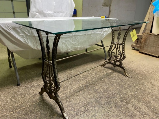 Early Iron base glass top table