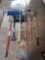 assortment of tools- shovels, snow shovel, rakes, hoes, broom, and more