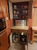 contents of basement kitchenette cabinet - glassware, metal cookware, pots, & more