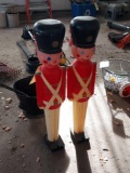 two plastic Christmas soldiers
