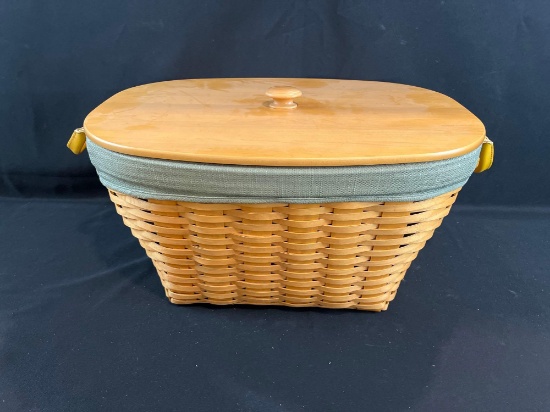 2001 Longaberger oval laundry basket w/ lid