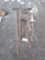 assortment of yard tools - axe, pickaxe, shovels, rake, and more