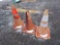 three piles of traffic cones
