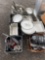 large assortment of metal pots, pans, and cookware