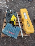 pallet of laser surveying tools