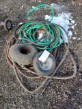assortment of hoses, tube, small wheel