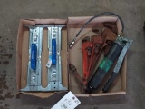 2 silverline paving slab lifters, 4 pipe wrenches, & a grease gun