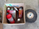 box of camp fuel & fuel/oil mix with large sanding discs