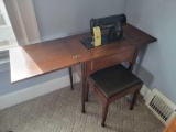 Singer console sewing machine with bench