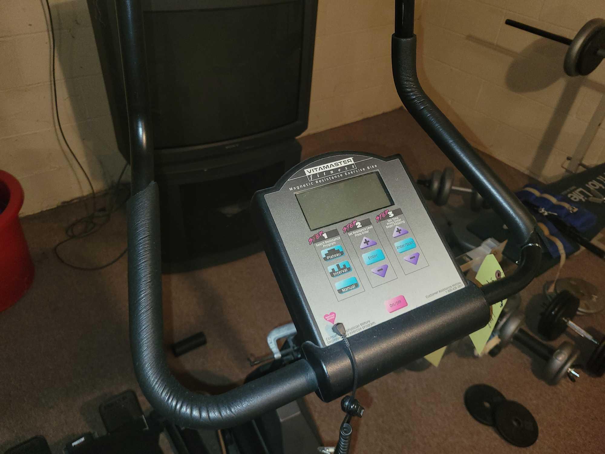 Vitamaster exercise bike and Precor rowing Proxibid