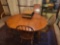 Ethan Allen dining room table with 4 chairs, table pads and extra leaf
