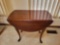 Mahogany drop leave end table with spinning top