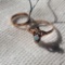 2 possible gold rings, one baby ring marked L10 and unmarked ring with stone