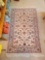 Oriental rug 60 inches long