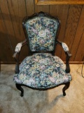 Upholstered arm chair with wood carved frame