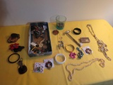 Box of costume jewelry, loops, clock keys and more