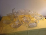 Group of clear glass, compotes, vases, glass basket, bowls, one signed bowl