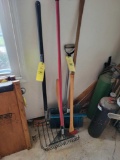 Snow shovels, fork, rake and axes