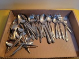 Box of assorted stainless flatware